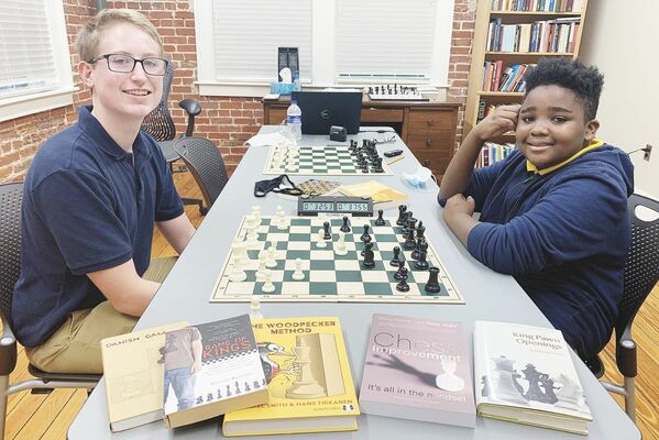 Benson Schexnaydre (left) and Austen Johnson (right) took part in the Mississippi Chess Association’s annual championship tournament held Oct. 23-24 at CSpire headquarters in Ridgeland. Schexnaydre, a Franklin County High School sophomore, claimed first-place honors and the MCA state championship during the event while Johnson, a seventh grader at Franklin County Middle School, finished in a four-way tie for second place in the U1500 competition at the tourney.  The duo have practiced their craft through the Franklin Chess Center in Meadville since 2015.
